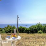Gite &agrave; Luri, Grand-Bastia, Haute-Corse, labellis&eacute; Gites de France : la terrasse couverte avec vue mer